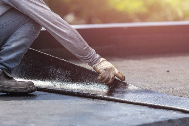 Professional Basement Waterproofing technician working in Newton, KS